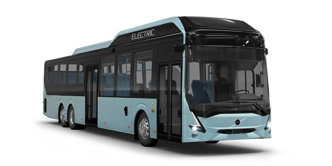Volvo_8900 Electric_1080x540px Light blue Volvo 8900 Electric, a fully electric bus, photographed against a white background.